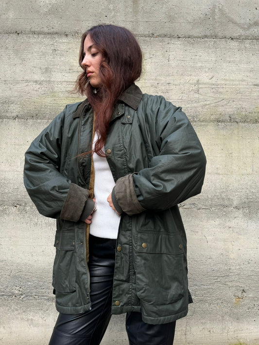 Giacca oversize cerata tipo Barbour, interamente foderata in ecopelliccia a pelo raso