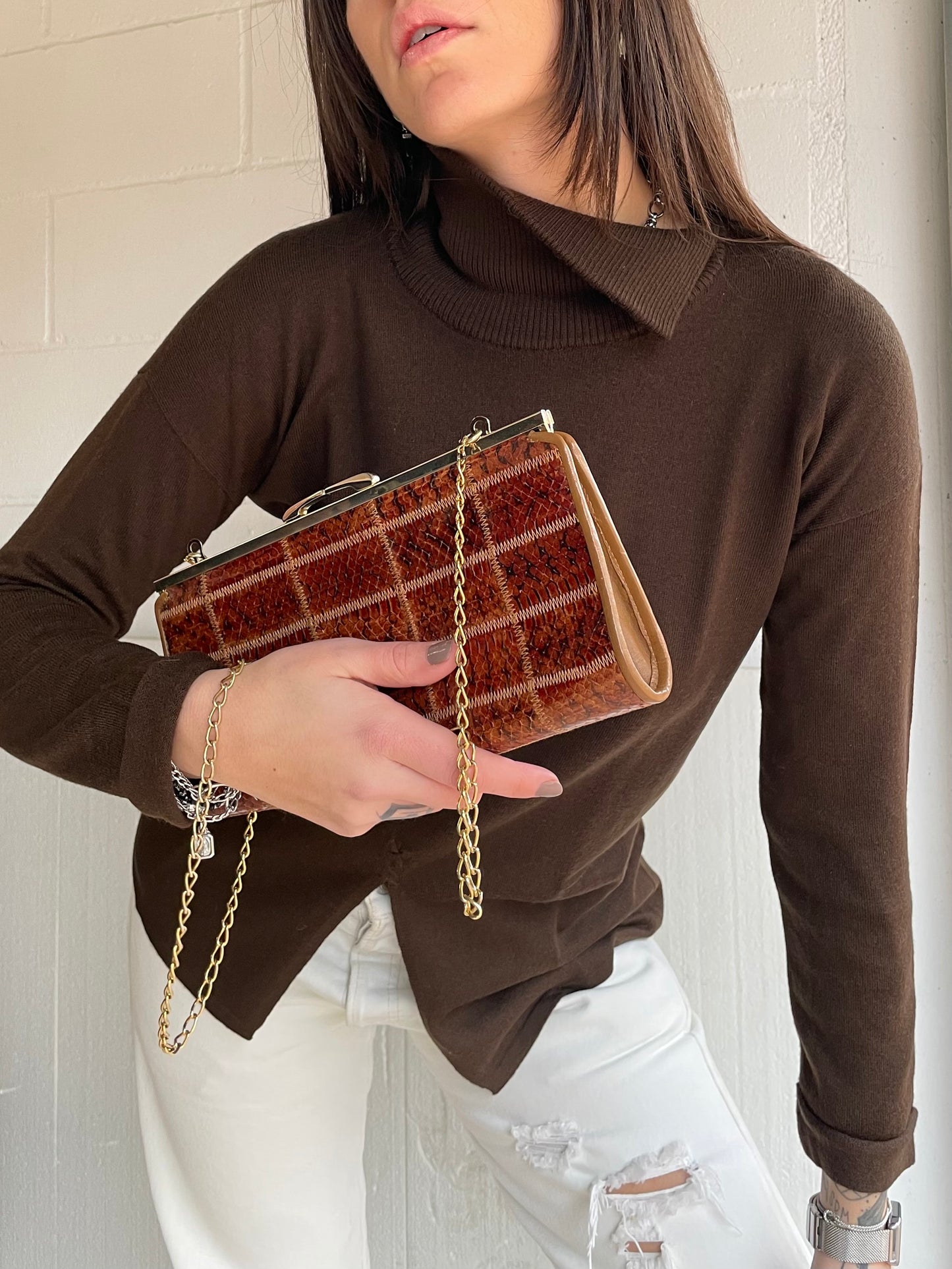 Clutch con tracolla a catena vera pelle