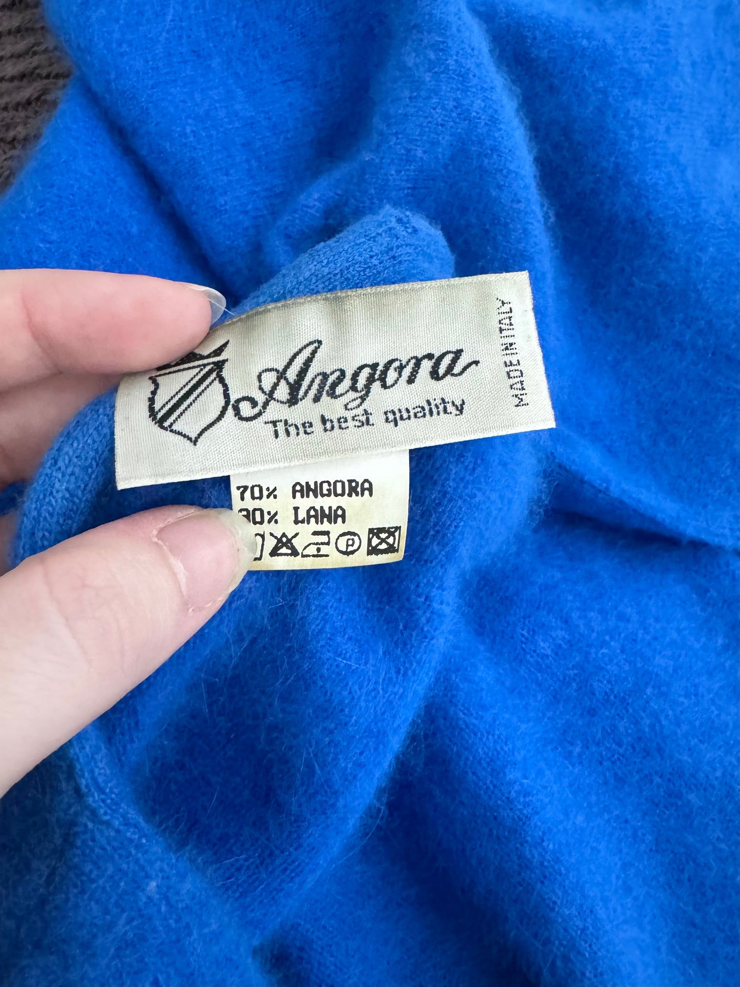 Cardigan blu chino 70% angora 30% lana