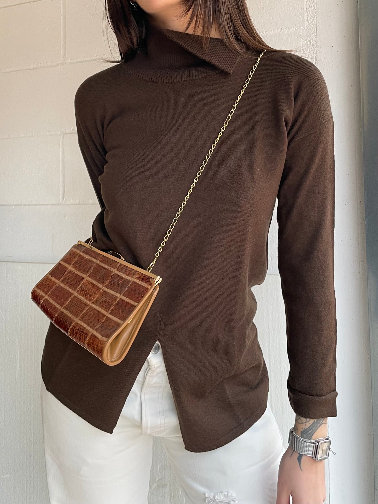 Clutch con tracolla a catena vera pelle