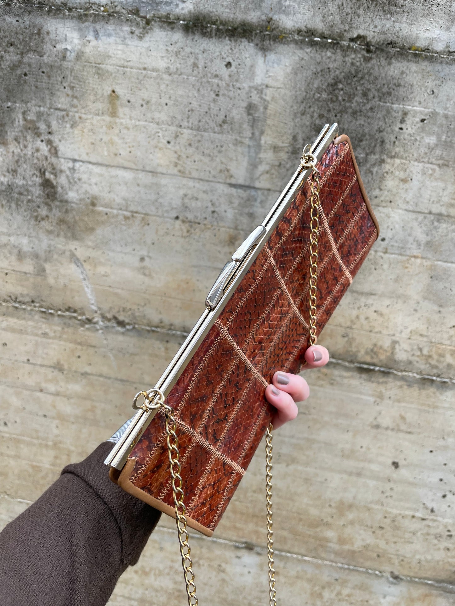 Clutch con tracolla a catena vera pelle