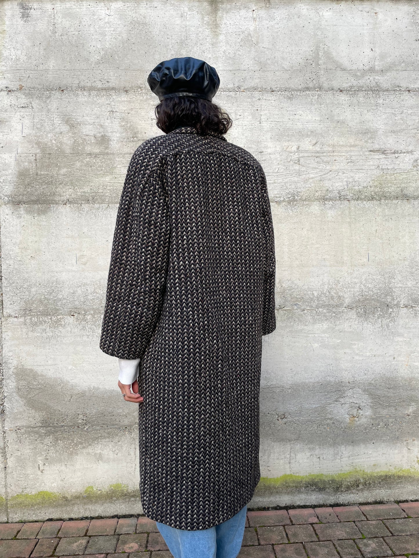 Cappotto sartoriale in lana spigato, con inserti in vera pelle