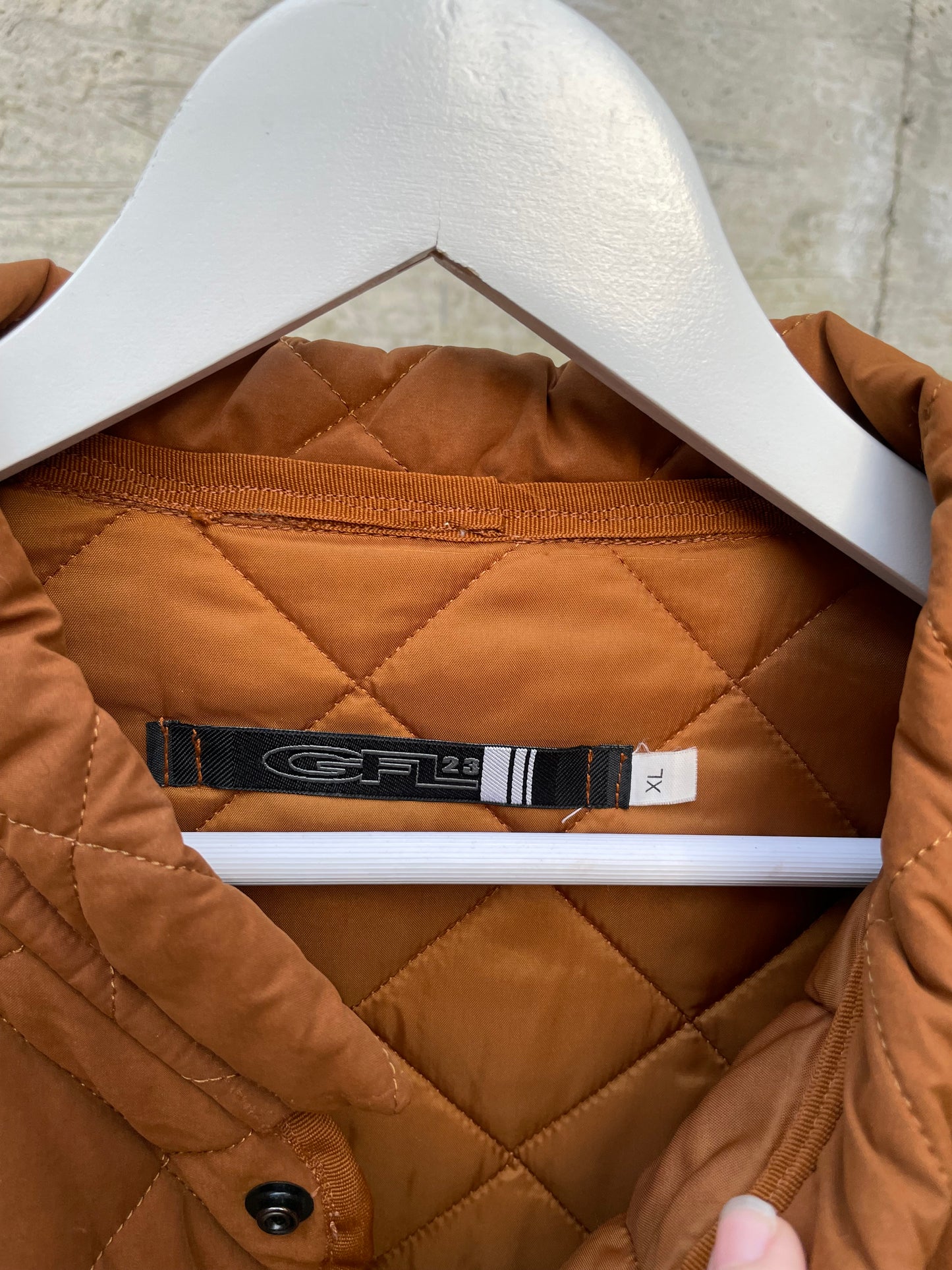 Husky trapuntato ruggine con bottoni a clip