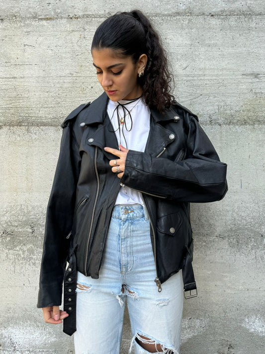 Chiodo nero in vera pelle martellata, pari a nuovo