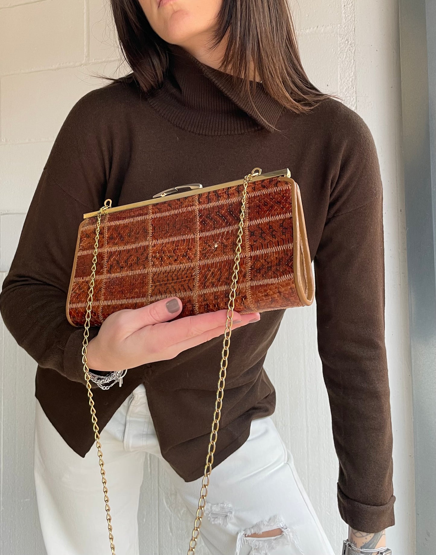 Clutch con tracolla a catena vera pelle