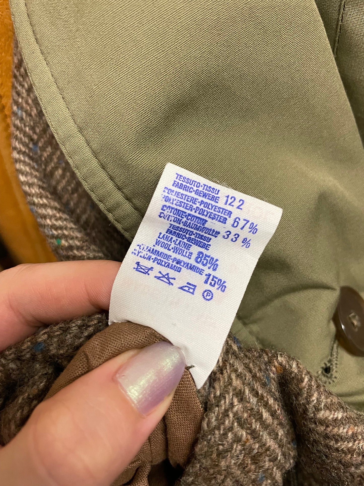 Trenchcoat double face Preca. Da un lato impermeabile misto cotone, dall'altro cappotto spigato in pura lana