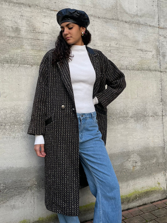 Cappotto sartoriale in lana spigato, con inserti in vera pelle