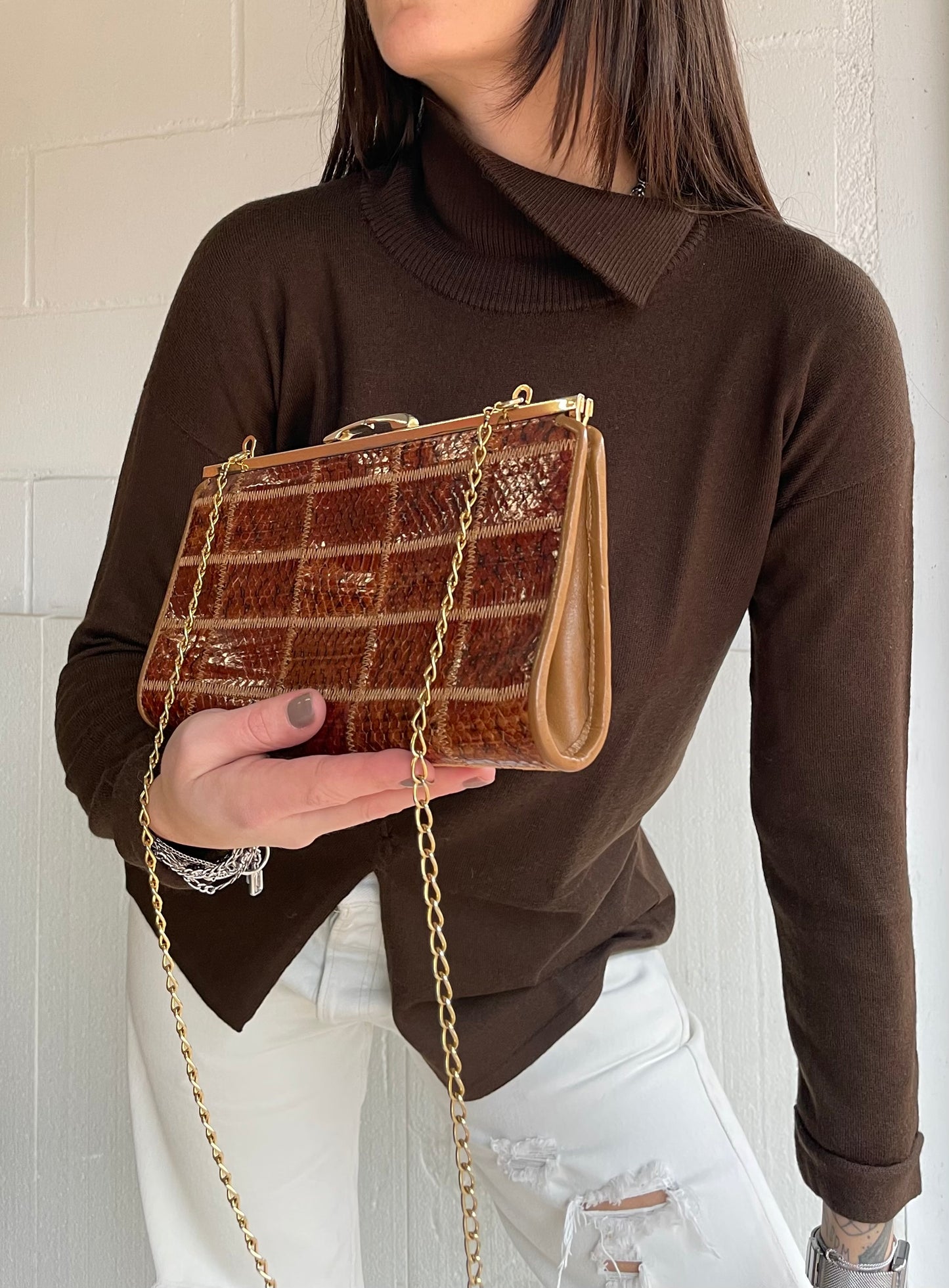 Clutch con tracolla a catena vera pelle