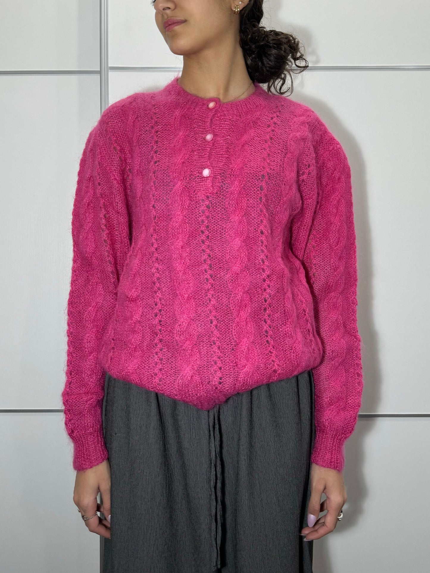 Maglione girocollo crochet fucsia in lana