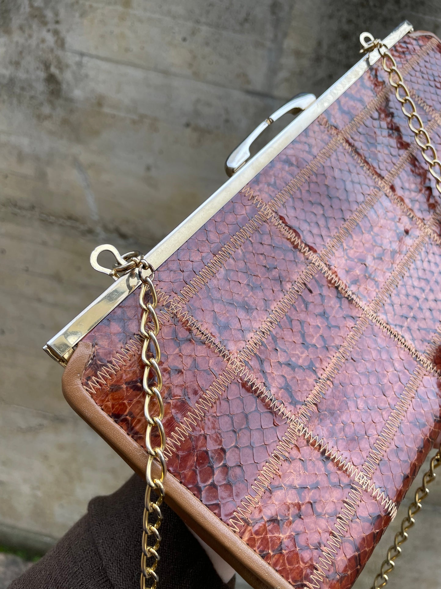 Clutch con tracolla a catena vera pelle