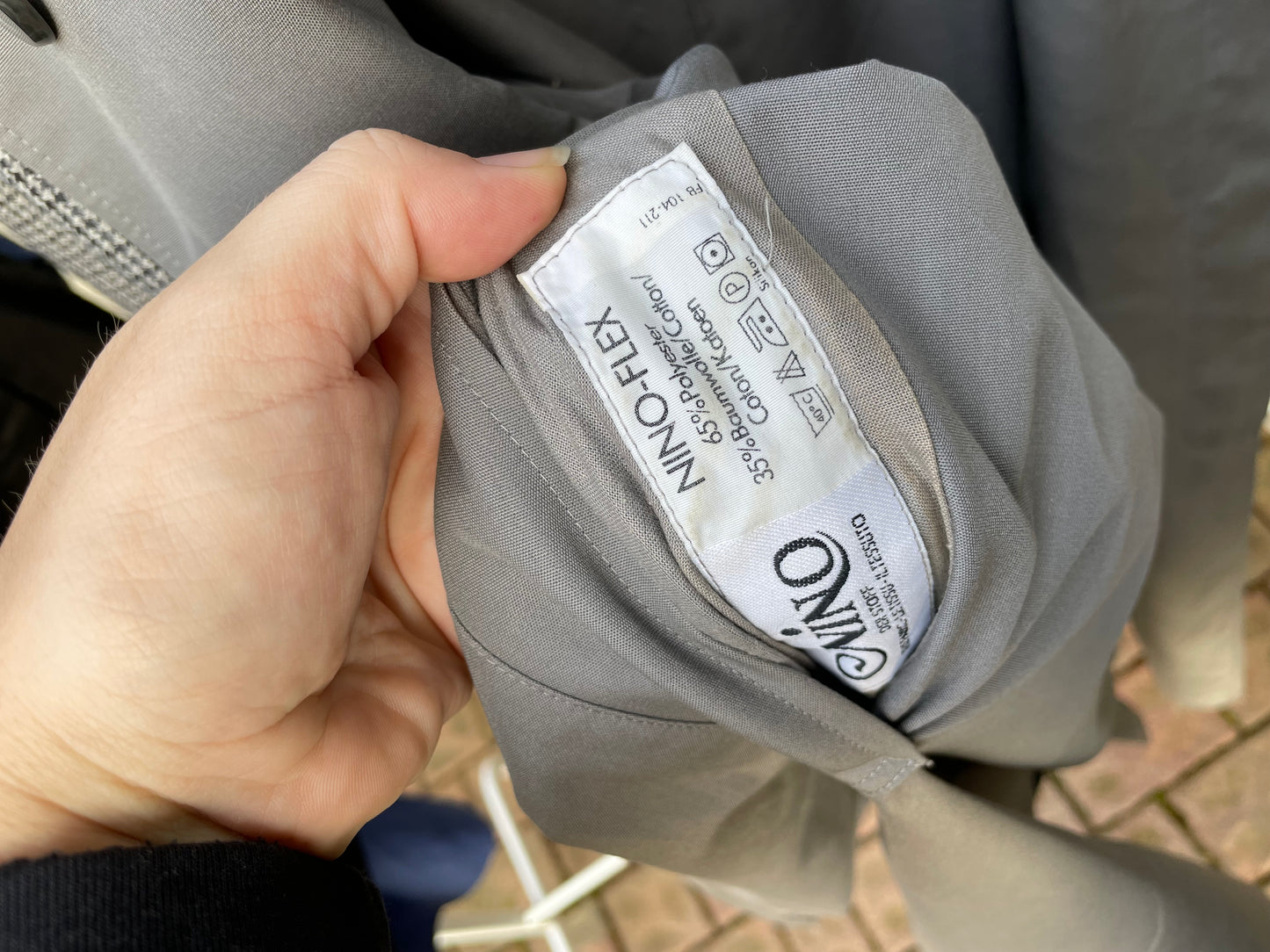 Trenchcoat/cappotto Nino monopetto double face, da un lato pura lana vergine pied de poule, dall'altro impermeabile misto cotone grigio