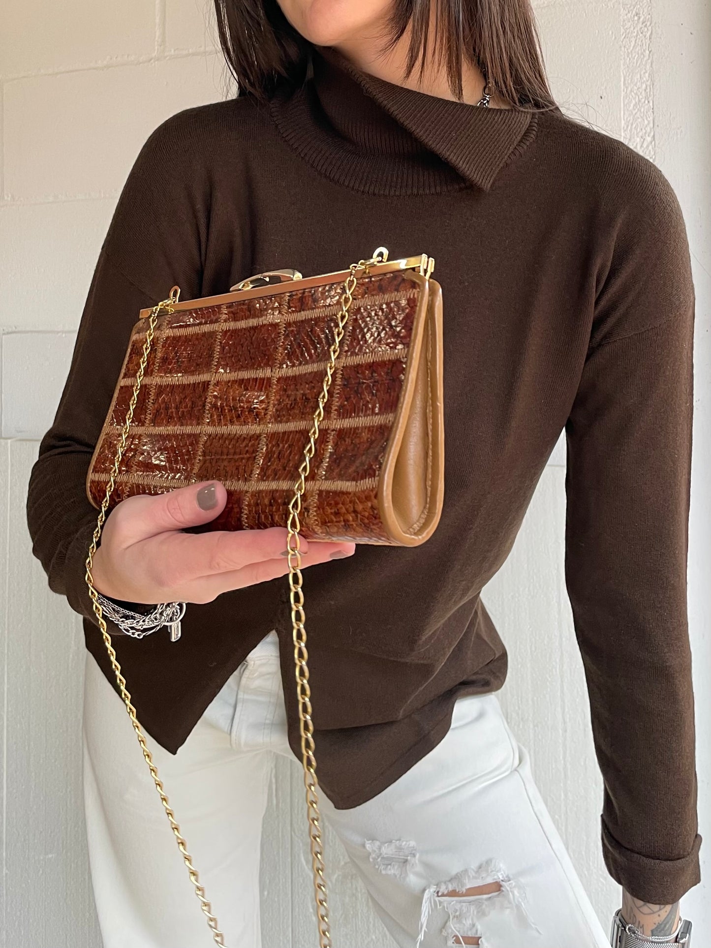 Clutch con tracolla a catena vera pelle