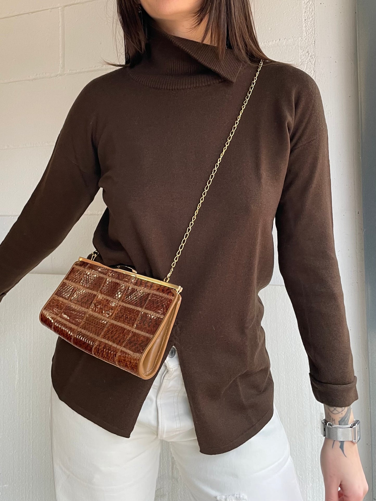 Clutch con tracolla a catena vera pelle