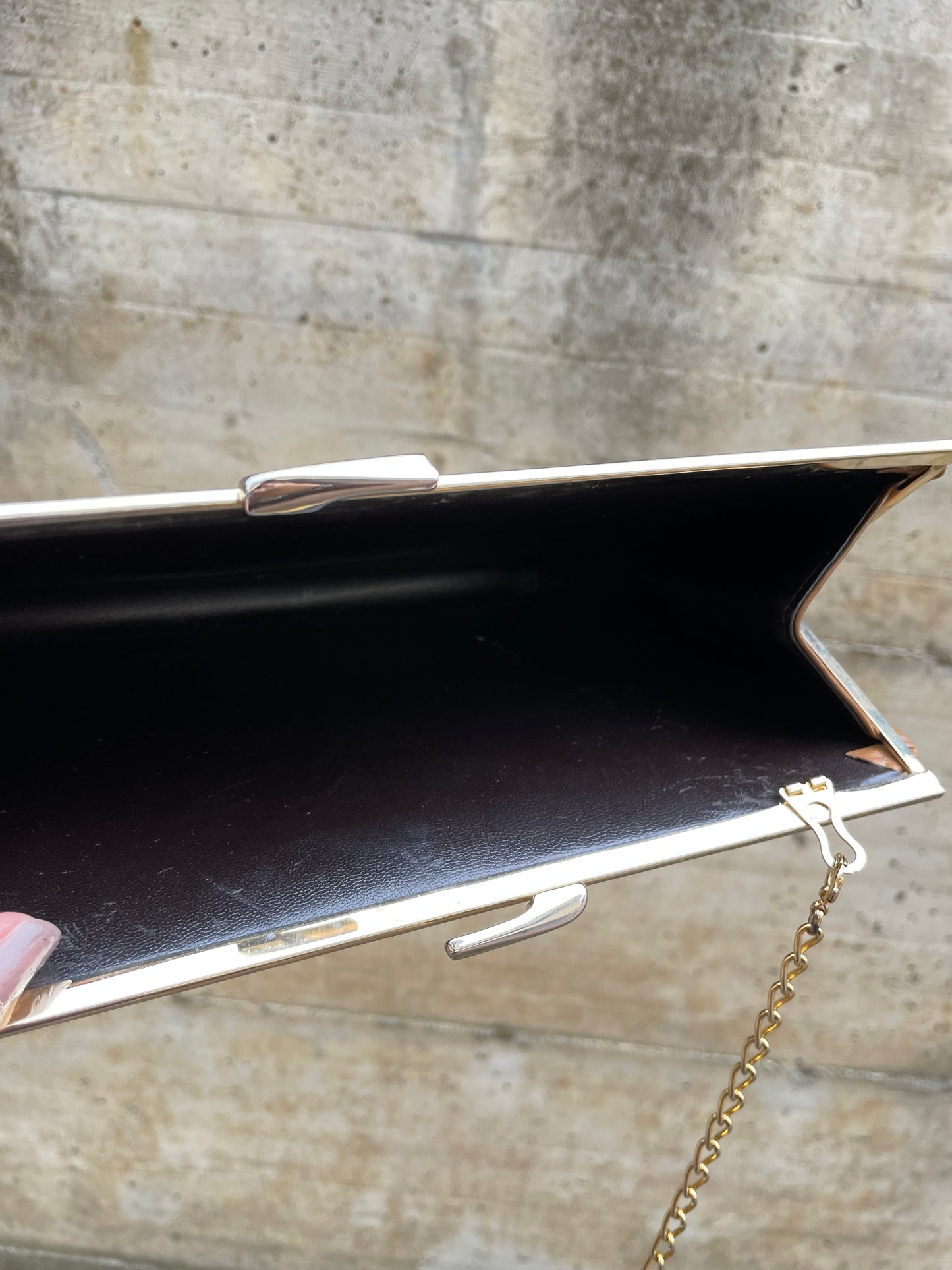 Clutch con tracolla a catena vera pelle