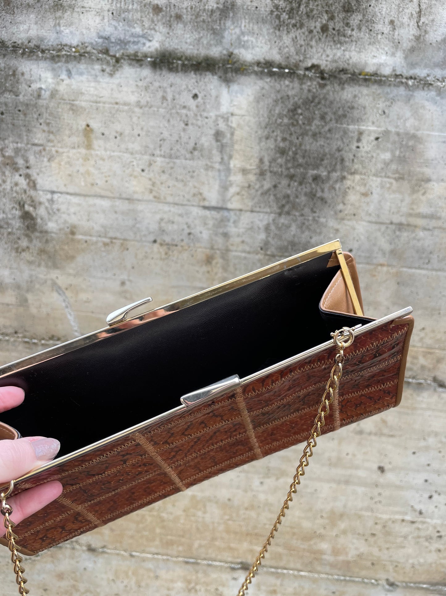 Clutch con tracolla a catena vera pelle