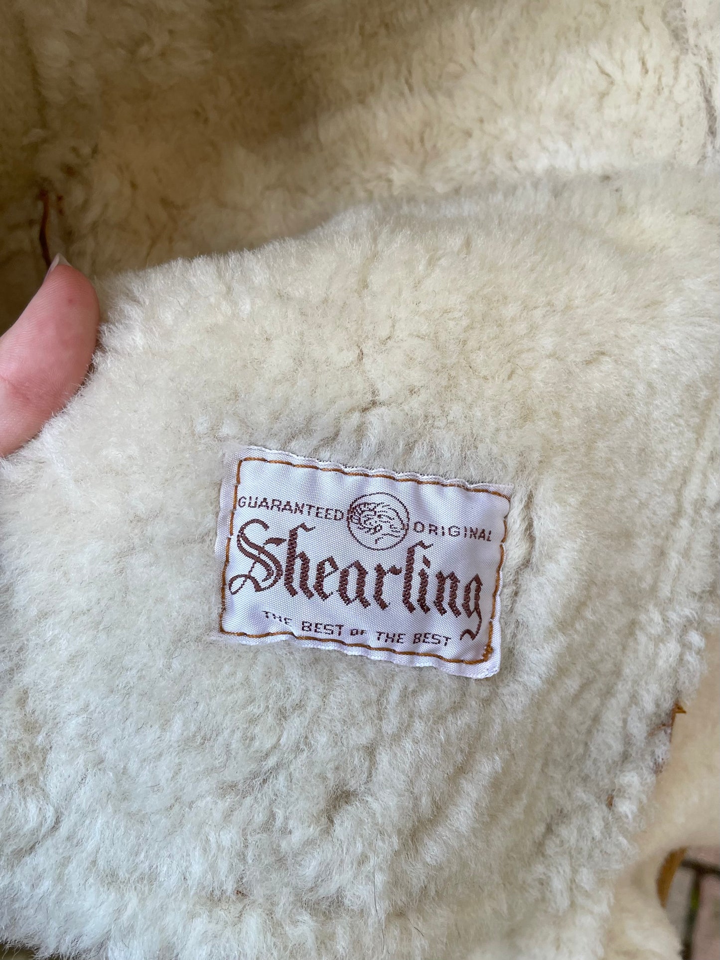 Montone Shearling originale a pelo bianco con esterno in pelle ruggine