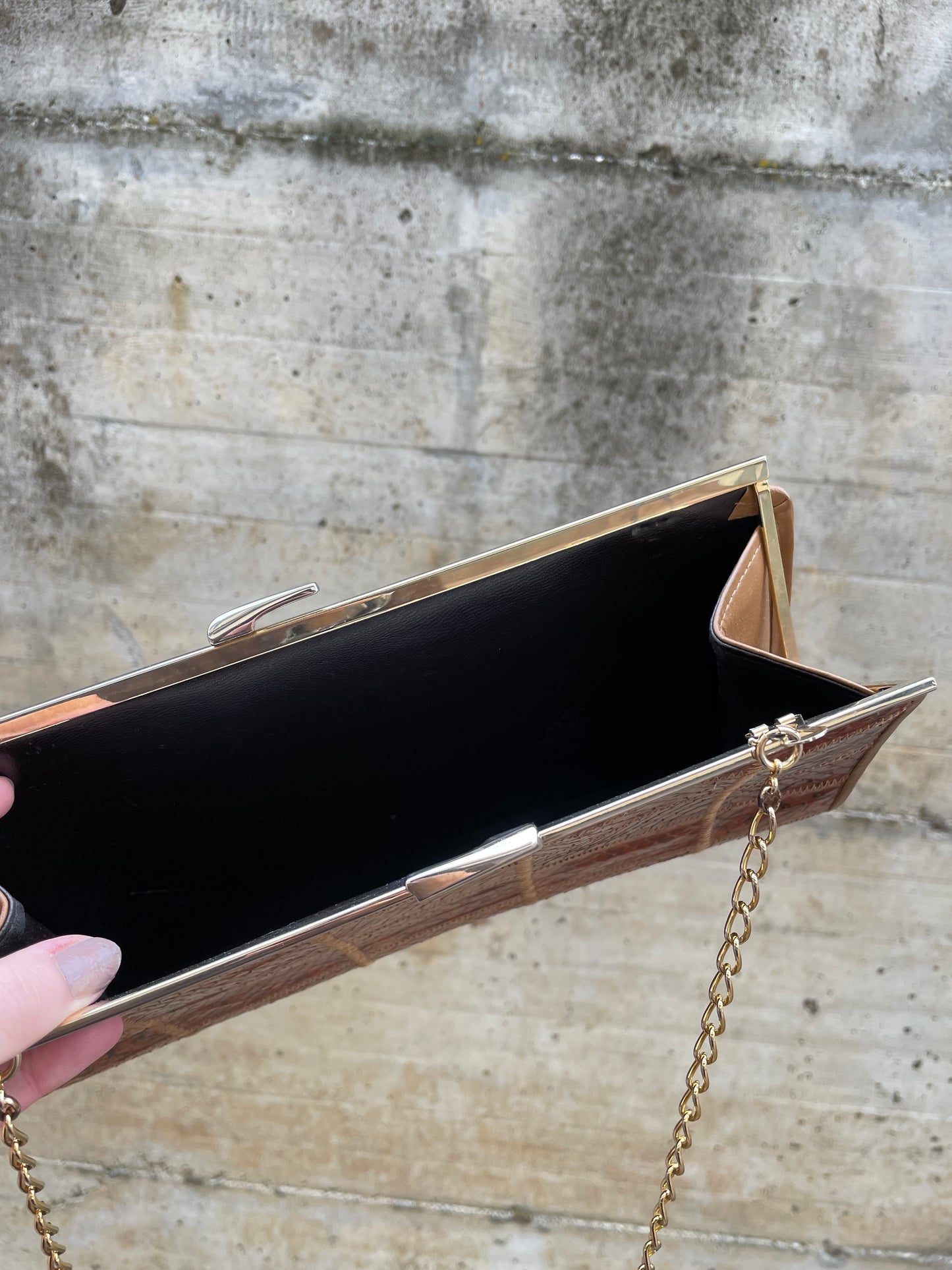 Clutch con tracolla a catena vera pelle